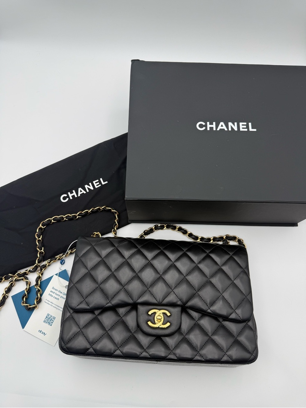 CHANEL Black Classic Double Flap Jumbo in Lambskin